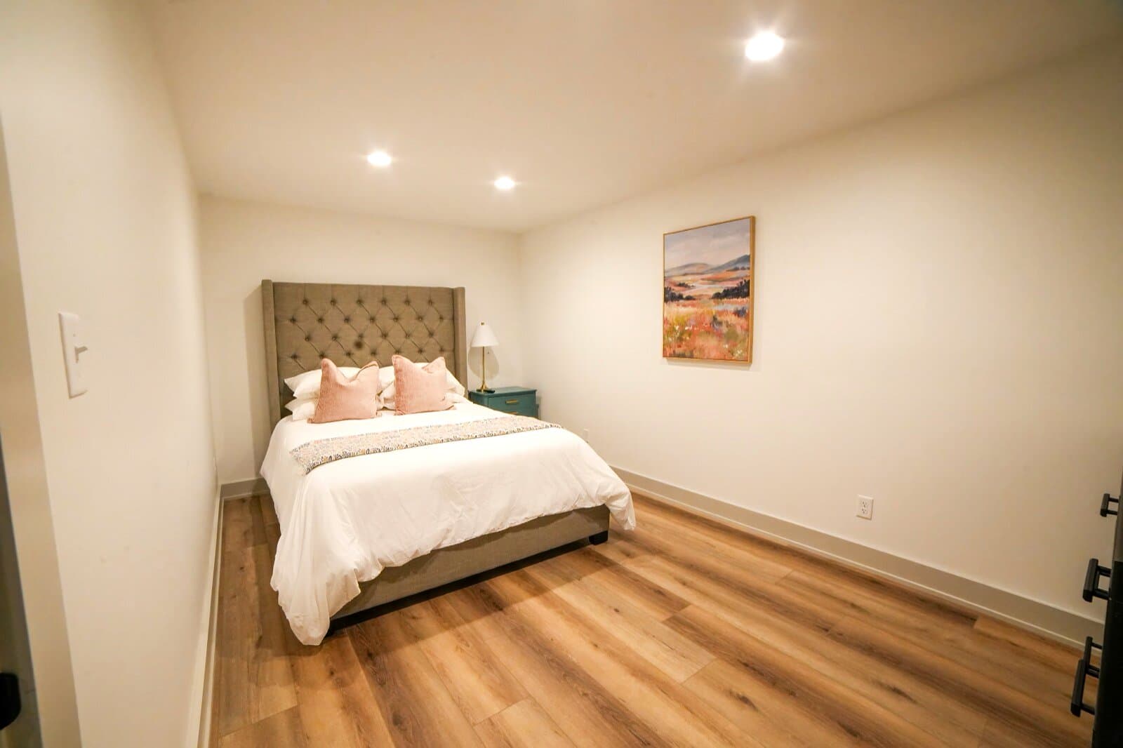 Queen · basement — Queen bed, shares basement bath