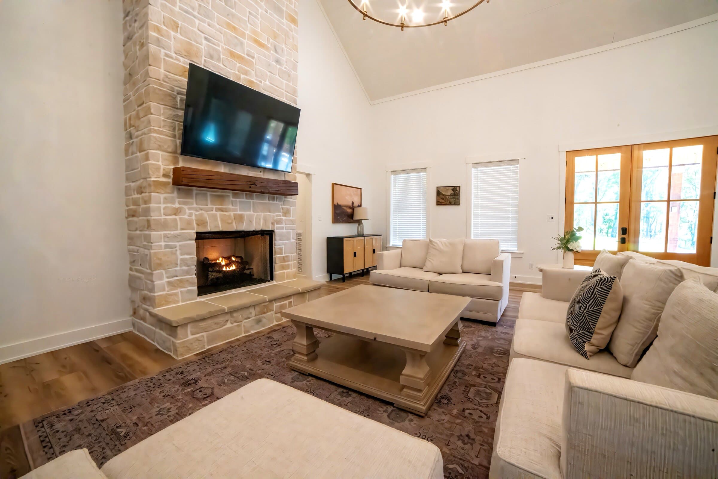 Stone fireplace — Real wood-burning stone fireplace at the heart of the main floor